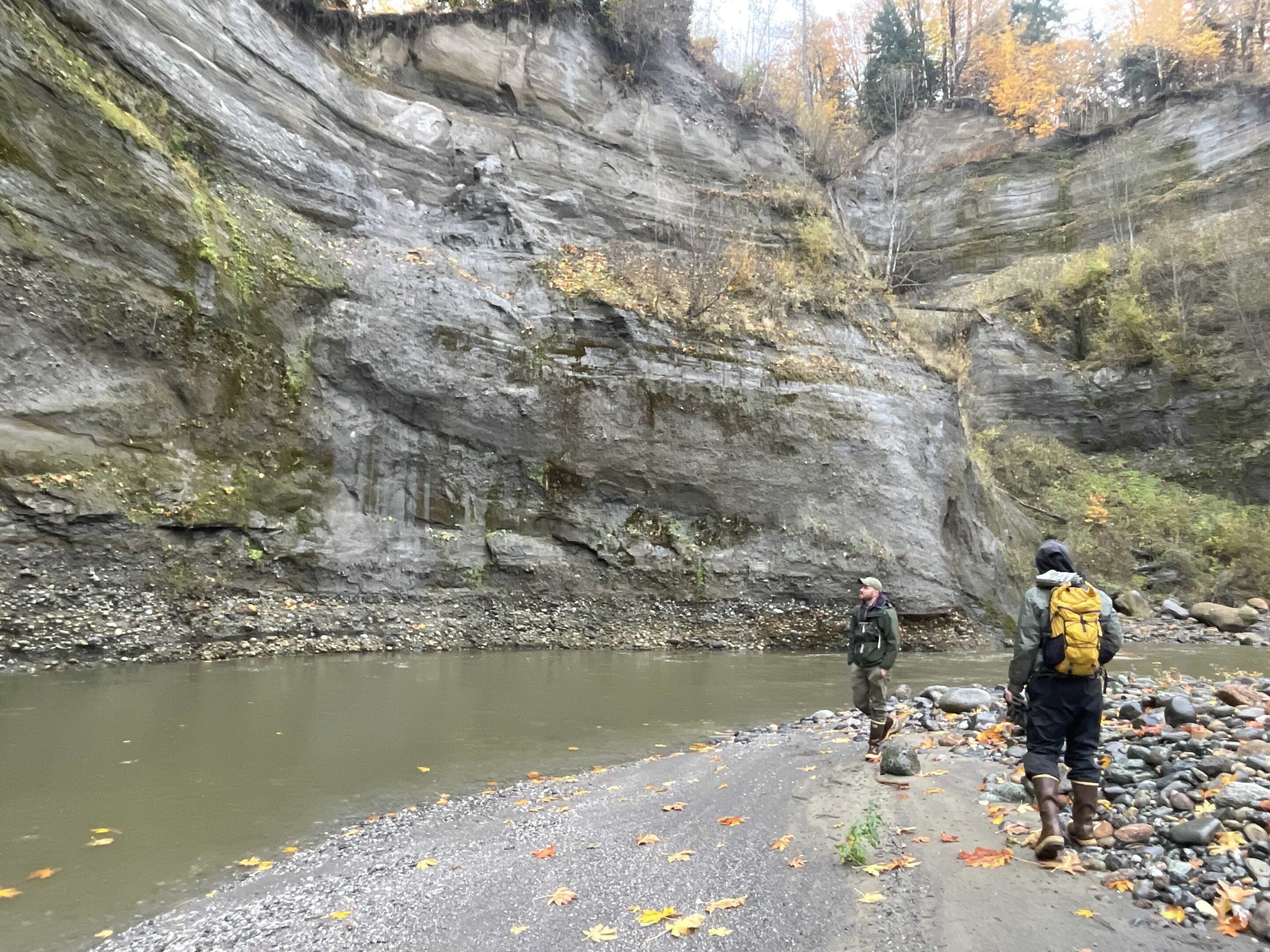 Alex and Bryce standing by the river at Elk Flats